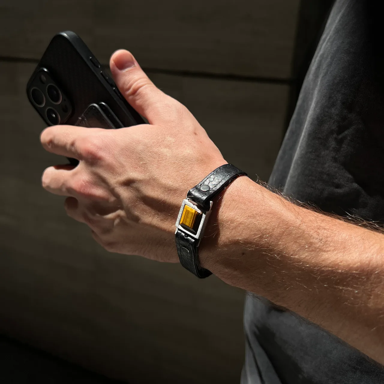 Men’s Core bracelet with natural Tiger Eye stone on wrist by Jewel Cocktail with hidden message inside